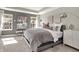 Spacious main bedroom boasts ample natural light and contemporary decor at 6702 Halsey St, Zionsville, IN 46077