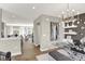 Well-lit home office area with stylish decor, modern furniture, and convenient access to the living area at 6702 Halsey St, Zionsville, IN 46077
