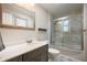 Clean bathroom featuring a shower, vanity, and neutral color palette at 7482 W Us Highway 40, Indianapolis, IN 46229