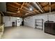 Spacious laundry room with modern washer and dryer set, wire rack shelving, and ample room for folding and storage at 7482 W Us Highway 40, Indianapolis, IN 46229