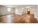 Living room with hardwood floors and natural lighting at 7482 W Us Highway 40, Indianapolis, IN 46229