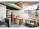 Unfinished basement area with storage and a work table at 8641 Cholla Rd, Indianapolis, IN 46240