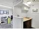 Basement wet bar has granite counters and white cabinets at 8641 Cholla Rd, Indianapolis, IN 46240