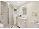 Bright bathroom featuring white vanity, a toilet and a standing shower at 8641 Cholla Rd, Indianapolis, IN 46240