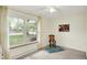 Bedroom featuring large window and hardwood chair at 8641 Cholla Rd, Indianapolis, IN 46240