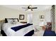 Comfortable bedroom with stylish accents, a plush bed, and natural light for a serene living space at 8641 Cholla Rd, Indianapolis, IN 46240