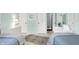 Bedroom featuring light blue walls, two twin beds and a floral rug at 8641 Cholla Rd, Indianapolis, IN 46240