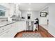 Modern kitchen featuring stainless steel appliances, white cabinetry, granite countertops, and an open design at 8641 Cholla Rd, Indianapolis, IN 46240