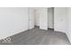 Bedroom features neutral carpet and a closet with a door at 8715 Hollander Dr, Camby, IN 46113