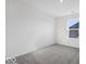 Bedroom with neutral carpet, big window, and an electrical outlet at 8715 Hollander Dr, Camby, IN 46113