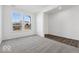 Sunlit bedroom featuring hardwood flooring, plush carpet, and large windows at 8715 Hollander Dr, Camby, IN 46113