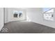 Large empty bedroom with big windows at 8715 Hollander Dr, Camby, IN 46113