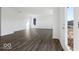 Bright and airy living room with hardwood flooring and ample space for entertaining at 8715 Hollander Dr, Camby, IN 46113