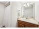 Bright bathroom featuring a vanity, mirror, and shower with neutral finishes at 8802 W 86Th St, Indianapolis, IN 46278