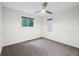 Cozy bedroom features neutral decor, natural light, and modern ceiling fan at 8802 W 86Th St, Indianapolis, IN 46278