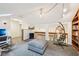 Inviting bedroom featuring vaulted ceiling, an egg chair, and stylish decor for a relaxing personal space at 8802 W 86Th St, Indianapolis, IN 46278