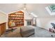 Cozy bedroom with unique architectural details, a fireplace, and built-in bookshelves for a warm atmosphere at 8802 W 86Th St, Indianapolis, IN 46278