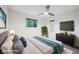 Comfortable primary bedroom featuring natural light and stylish decor with a modern media center at 8802 W 86Th St, Indianapolis, IN 46278