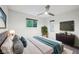 Comfortable primary bedroom featuring natural light and stylish decor with a modern media center at 8802 W 86Th St, Indianapolis, IN 46278