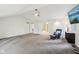 Bright primary bedroom boasts vaulted ceilings, a ceiling fan, and an ensuite bathroom with modern fixtures at 8802 W 86Th St, Indianapolis, IN 46278