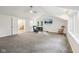 Bright primary bedroom boasts vaulted ceilings, a ceiling fan, and an ensuite bathroom with modern fixtures at 8802 W 86Th St, Indianapolis, IN 46278