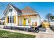 Stylish exterior showcasing the front yard, covered porch, and detailed architectural elements at 918 S State Ave, Indianapolis, IN 46203
