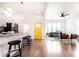 Inviting living space with kitchen island, counter seating, and a glimpse of the cozy living area at 918 S State Ave, Indianapolis, IN 46203