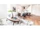 Bright living room with hardwood floors, modern furniture, and stylish decor, creating a comfortable and inviting space at 918 S State Ave, Indianapolis, IN 46203