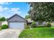 Charming single-story home featuring a two-car garage and well-maintained landscaping at 926 Brookside Ln, Plainfield, IN 46168