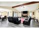 Bright living room with vaulted ceiling, brick fireplace, and open floor plan at 926 Brookside Ln, Plainfield, IN 46168