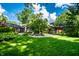 Private backyard features manicured lawn and patio area at 9550 Copley Dr, Indianapolis, IN 46260