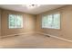 Light-filled bedroom with neutral carpet and walls, offering a blank canvas for personalization at 9550 Copley Dr, Indianapolis, IN 46260
