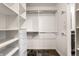 Walk-in closet with custom shelving and drawers for optimal storage solutions at 9550 Copley Dr, Indianapolis, IN 46260