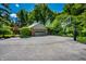 Home features a basketball hoop near a detached garage at 9550 Copley Dr, Indianapolis, IN 46260