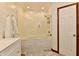 Bright bathroom with a tub-shower combo and modern vanity at 1010 Lakewood N Dr, Brownsburg, IN 46112
