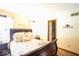 Cozy bedroom with a large bed, soft lighting, and calming decor at 1010 Lakewood N Dr, Brownsburg, IN 46112