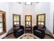 Bright bonus room featuring multiple windows, comfortable seating, and natural light at 1010 Lakewood N Dr, Brownsburg, IN 46112