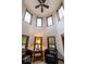 Bright and airy bonus room featuring multiple windows and comfortable seating arrangement at 1010 Lakewood N Dr, Brownsburg, IN 46112