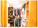 Spacious walk-in closet with shelves for shoes and folded garments, and lots of hanging storage at 1010 Lakewood N Dr, Brownsburg, IN 46112