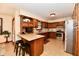 Kitchen with wood cabinets, granite countertops and stainless steel appliances at 1010 Lakewood N Dr, Brownsburg, IN 46112