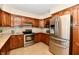 Well-equipped kitchen with stainless steel appliances and granite countertops at 1010 Lakewood N Dr, Brownsburg, IN 46112
