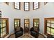 Sitting area with chair and windows at 1010 Lakewood N Dr, Brownsburg, IN 46112