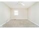 Bedroom with neutral walls, carpet flooring, a ceiling fan, and natural light at 10245 Briar Creek Ln, Carmel, IN 46033