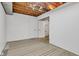 Spacious basement featuring neutral carpet, white walls, and a door to an additional room at 10444 N State Road 9, Fountaintown, IN 46130