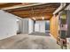 Open basement space with utility features and unfinished ceiling, offering potential for customization at 10444 N State Road 9, Fountaintown, IN 46130