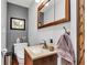 Well-lit bathroom with a modern sink and vanity at 10444 N State Road 9, Fountaintown, IN 46130