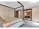 Bedroom featuring a mirrored closet and inviting decor at 10444 N State Road 9, Fountaintown, IN 46130