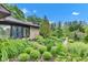 Lovely home with stone accents, lush landscaping, and inviting curb appeal at 10444 N State Road 9, Fountaintown, IN 46130