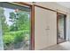Bright hallway with natural light and view to backyard through windows at 10444 N State Road 9, Fountaintown, IN 46130