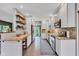 Modern kitchen featuring white cabinets, stainless steel appliances, and great counter space at 10444 N State Road 9, Fountaintown, IN 46130